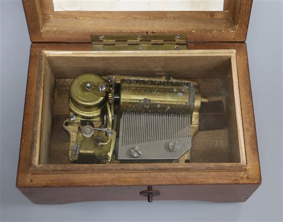 A Swiss walnut cased musical box, playing two airs